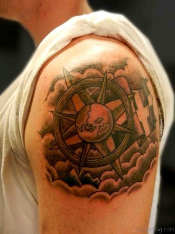 Ompass Ship Wheel Clouds Tattoo On Shoulder