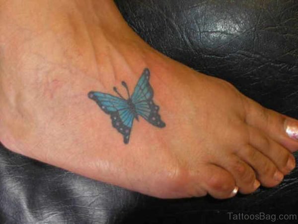 Adorable Blue Butterfly Tattoo