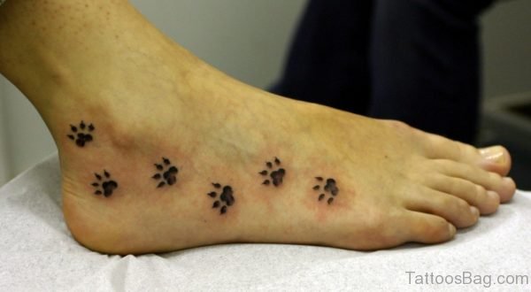 Adorable Paw Print Tattoo On Foot