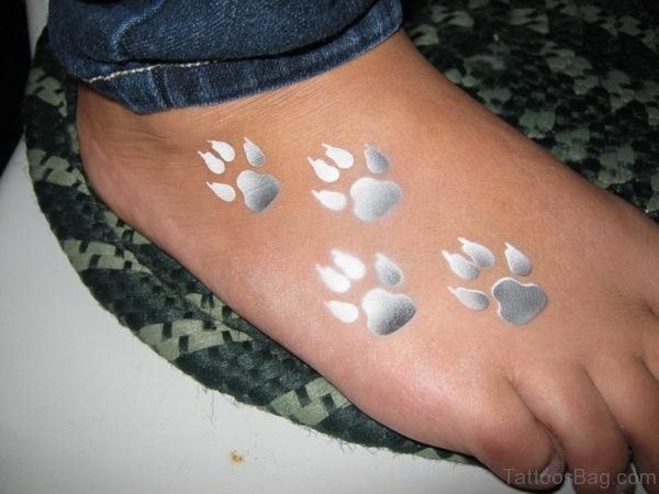 Airbrust Paw Print Tattoo On Foot