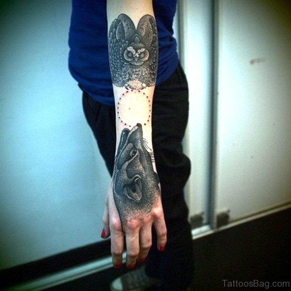 Alpha Wolf With Owl Tattoo Design
