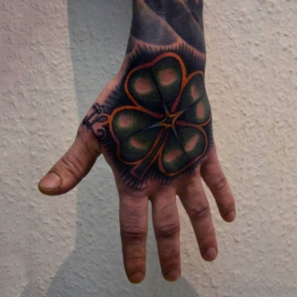 Amazing Four Leaf Clover Hand Tattoo On Man