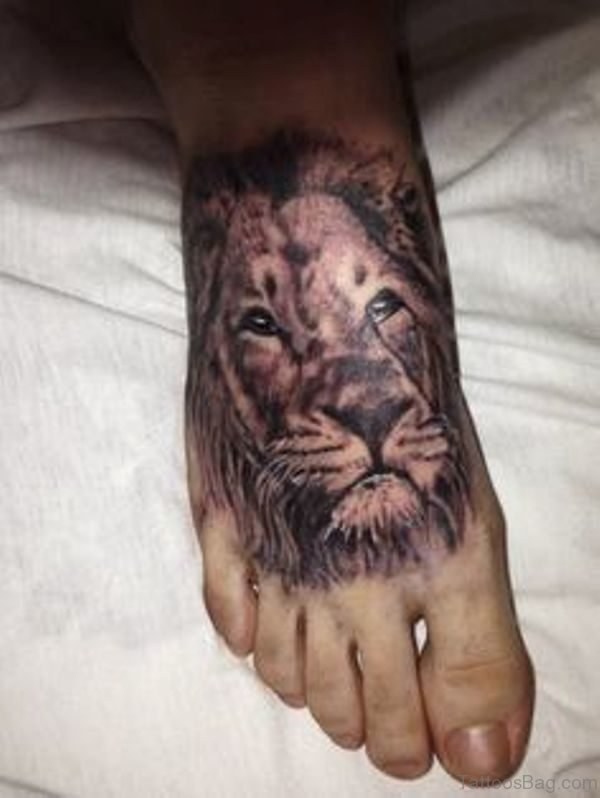 Amazing Lion Tattoo On Foot