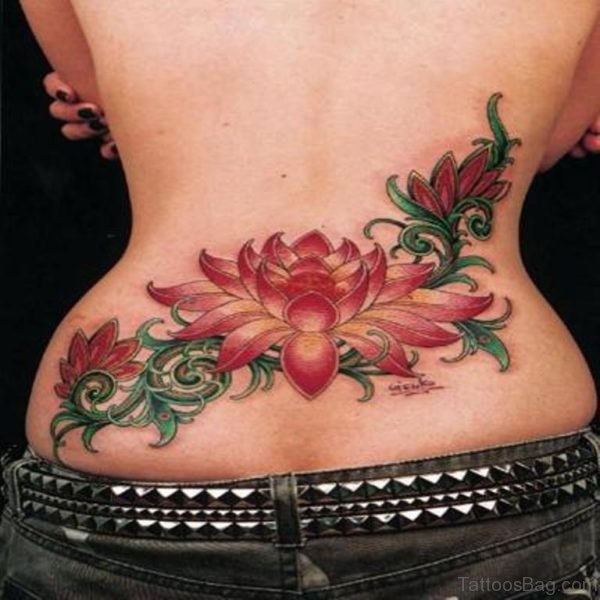 Amazing Lotus Flowers Tattoo On Girl Lower Back
