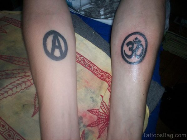 Anarchy Symbol And Om Tattoo On Arm