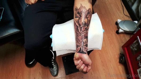 Angry Alpha Wolf Tattoo On Arm