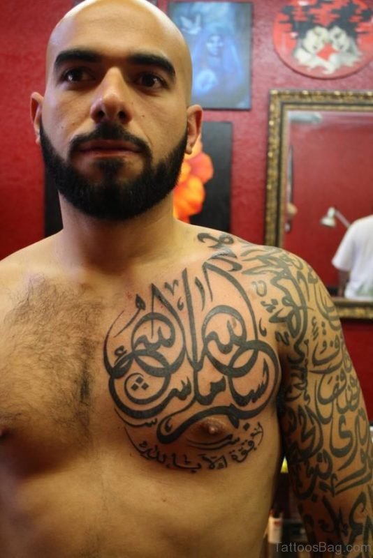 Arabic Long Tattoo On Chest Amd Shoulder