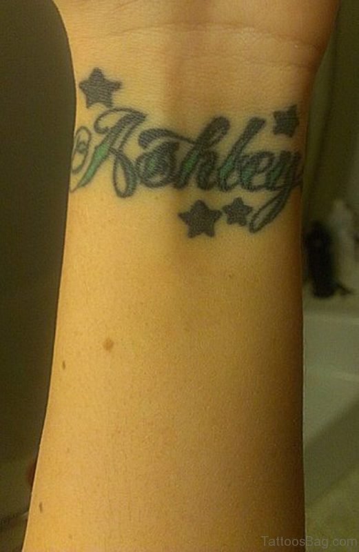 Ashley Words With Stars Tattoo On Wrist 
