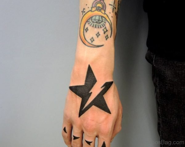 Attractive Star Tattoo On Hand