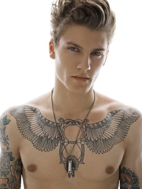 Attractive Wings Tattoo On Chest 