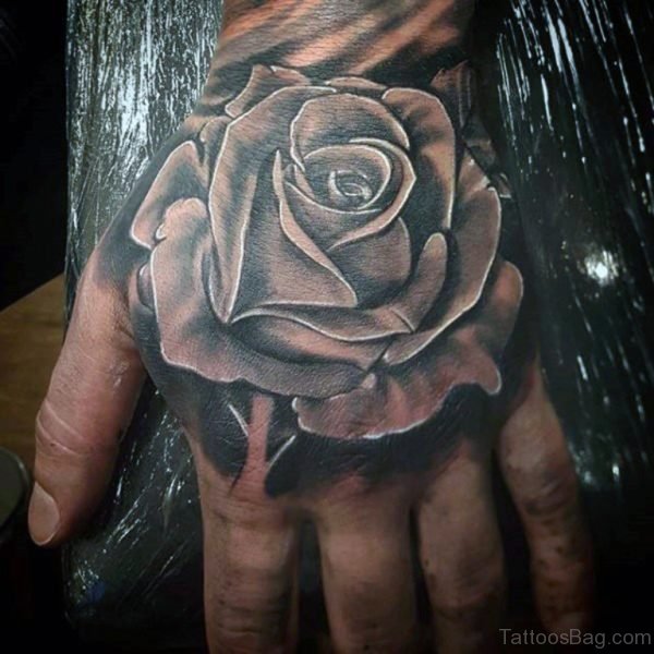 Awesome Black Rose Tattoo On Hand For Men