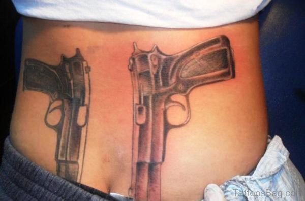 Awesome Gun Tattoo Design On Waist