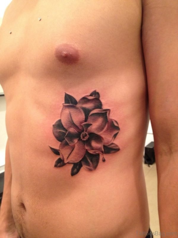 Awesome Magnolia Tattoo on Rib 