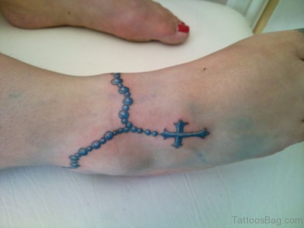 Awesome Rosary Beads Tattoo On Ankle