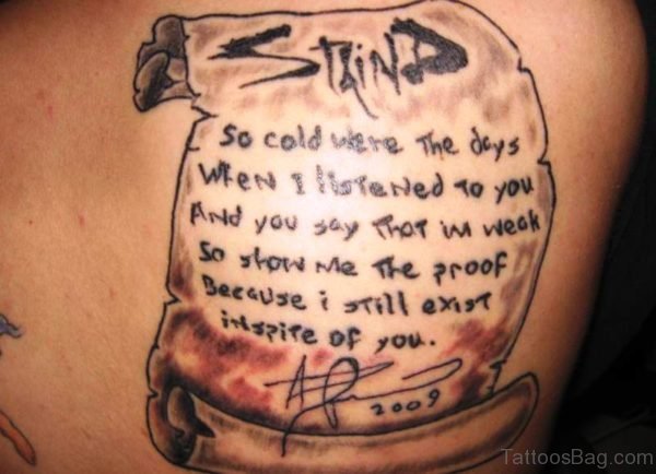 Awesome Scroll Tattoo On Back