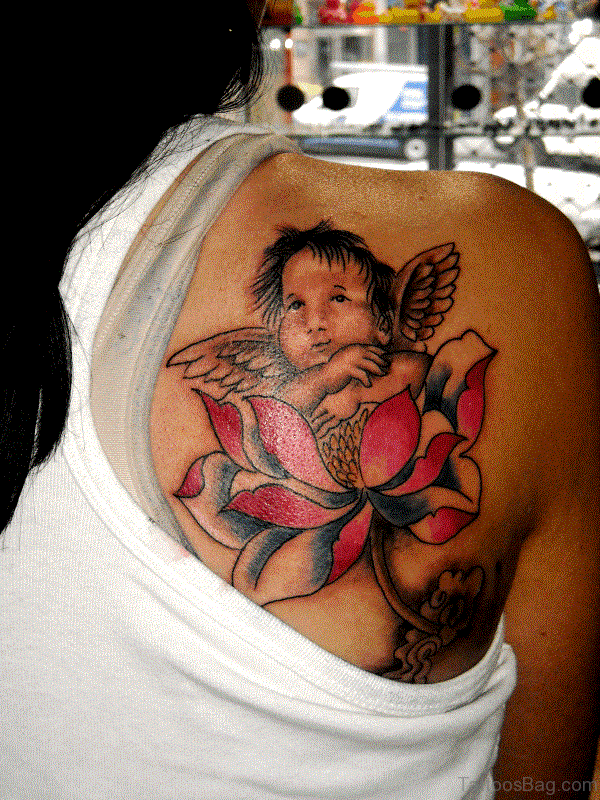 Baby Angel With Flower Tattoo On Shoulder