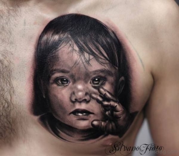 Baby Girl Portrait Tattoo On Chest 
