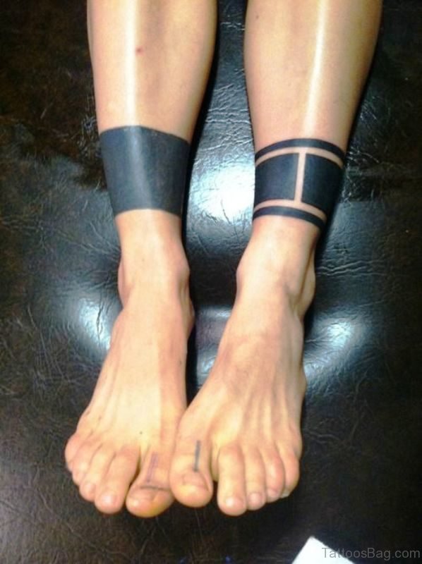 Band Tattoos On Both Legs