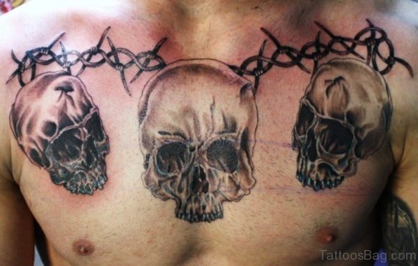 Barbed Wire And Skull Tattoo On Chest 