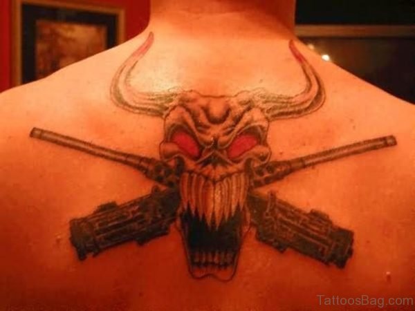 Big Teeth Bull Skull Tattoo With Gun On Back