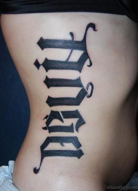 Black Ambigram Tattoo On Rib 