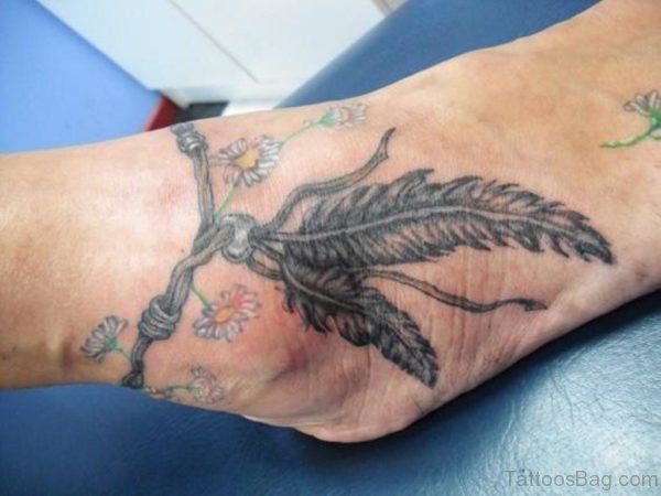 Black And Grey Feather Tattoo