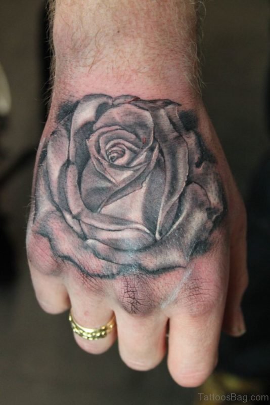 Black And Grey Rose Tattoo On Hand