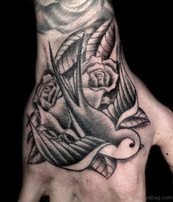 Black And Grey Swallow Tattoo On Hand 