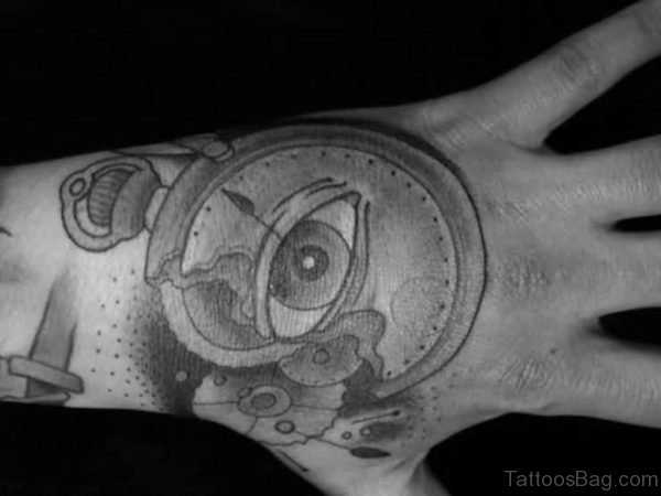 Black And White Eye Clock Tattoo On Hand