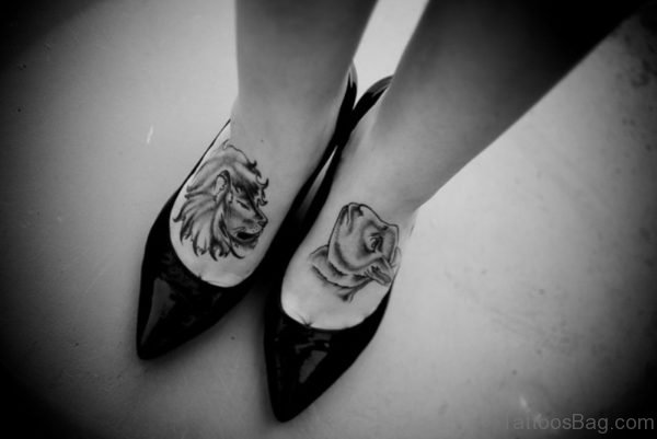 Black And White Lion Tattoo On Foot