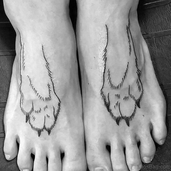 Black And White Paw Print Tattoo