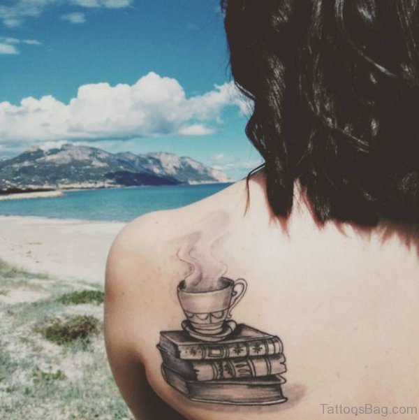 Black Book Tattoo On Shoulder
