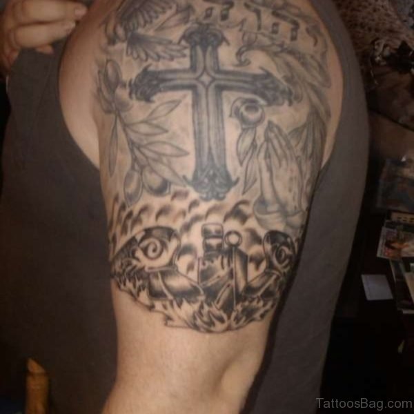 Black Cross Tattoo On Half Sleeve 