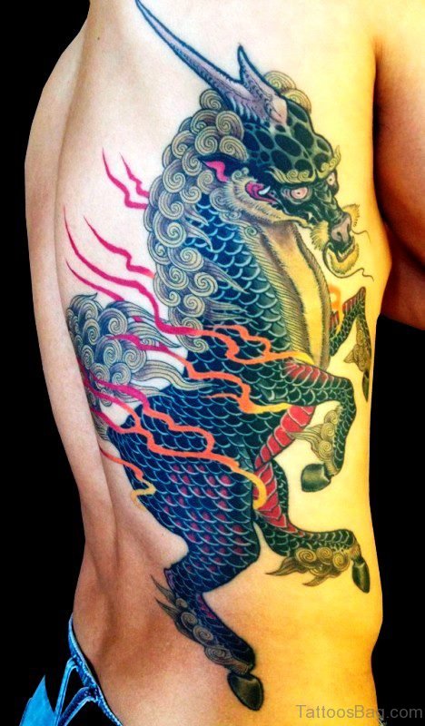 Black Flame Unicorn Tattoo On Rib