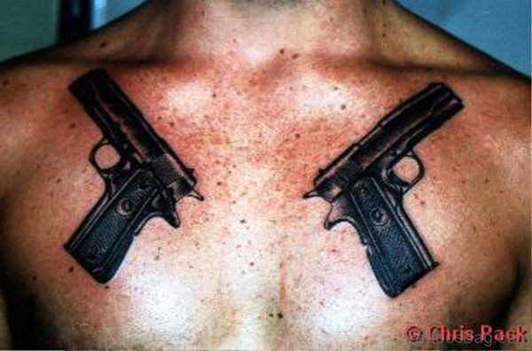 Black Guns Tattoo On Chest