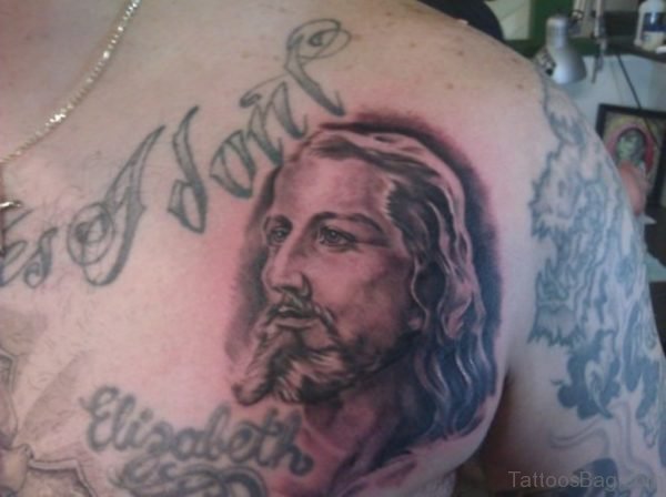 Black Ink Jesus Portrait Tattoo On Chest 