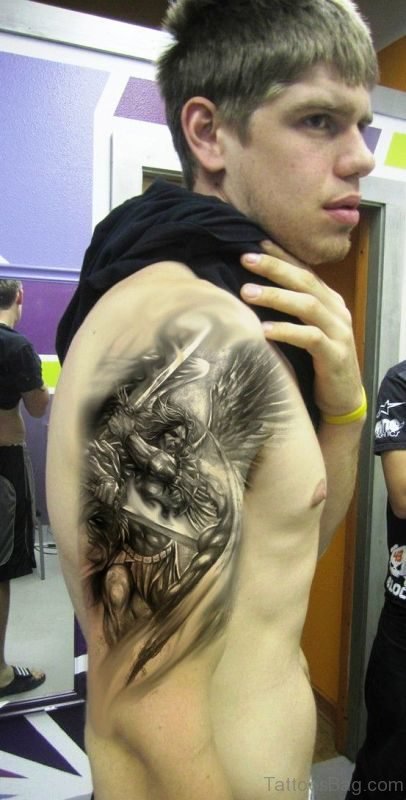 Black Inked Archangel Tattoo On Shoulder