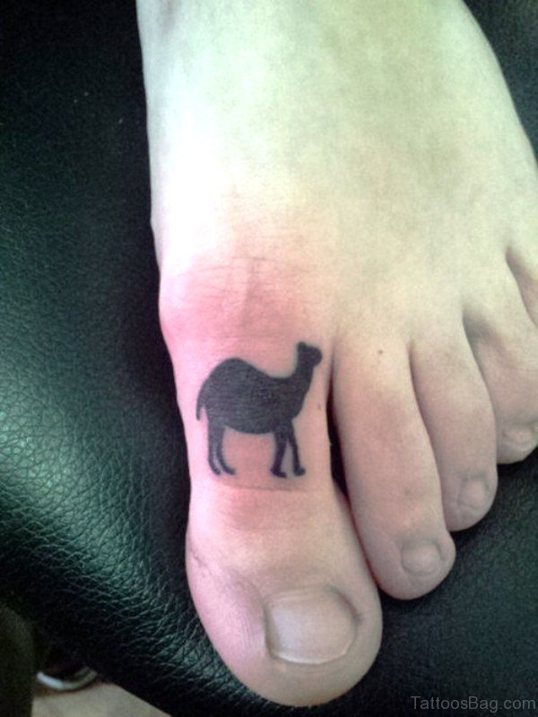 Black Inked Camel Tattoo On Toe