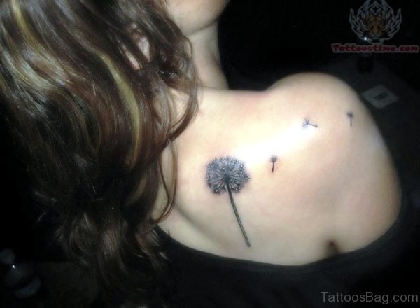 Black Inked Dandelion Tattoo On Shoulder