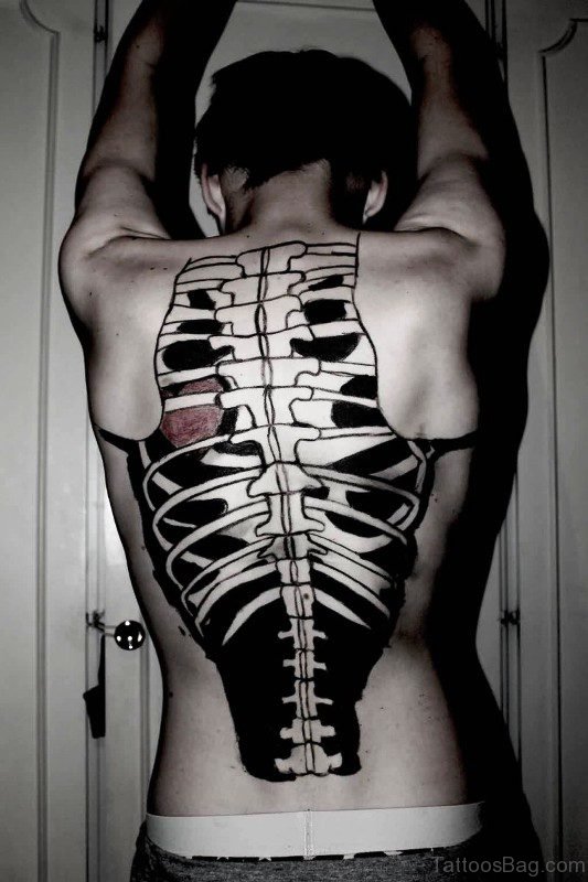 Black Inked Skeleton Tattoo On Back