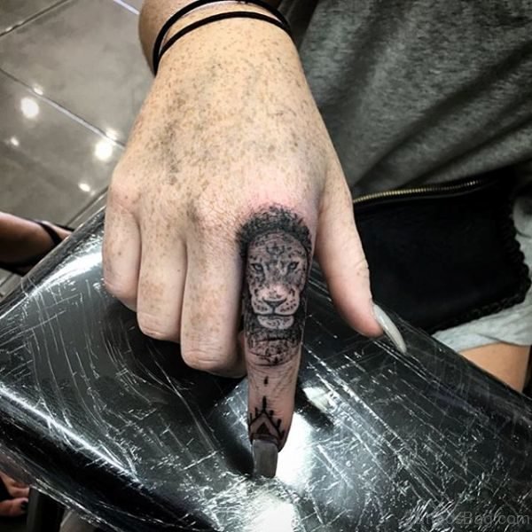 Black Lion Head Tattoo On Finger