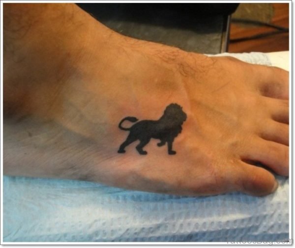 Black Lion Tattoo On Foot