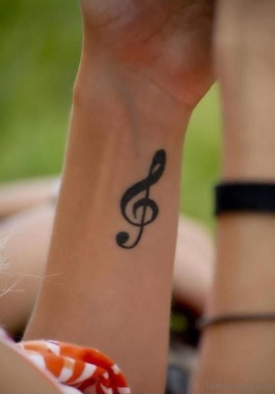 Black Music Word Tattoo On Wrist 