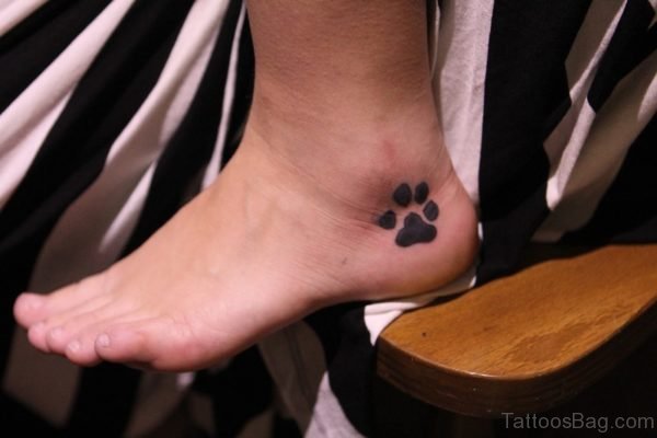 Black Paw Print Tattoo On Foot