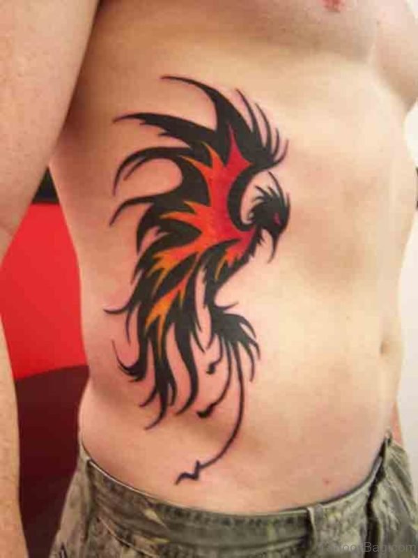 Black Phoenix Tattoo On Rib 