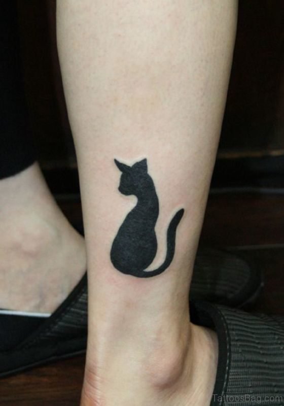 Black Sitting Cat Tattoo On Leg