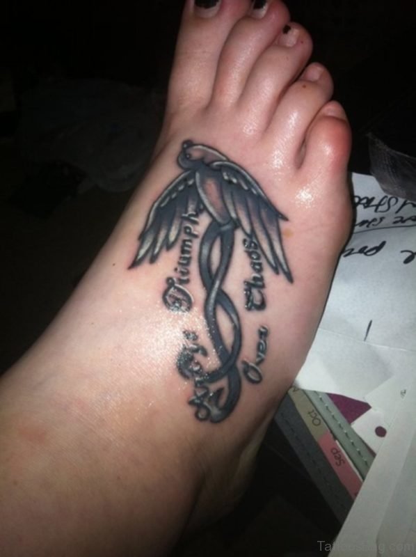 Black Swallow Tattoo On Foot 