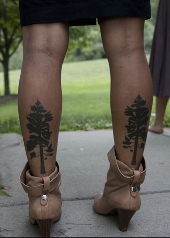 Black Tree Tattoo On Girl Both Leg Calf
