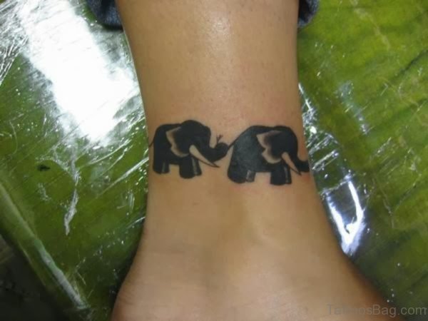 Black Two Elephant Tattoo On Leg