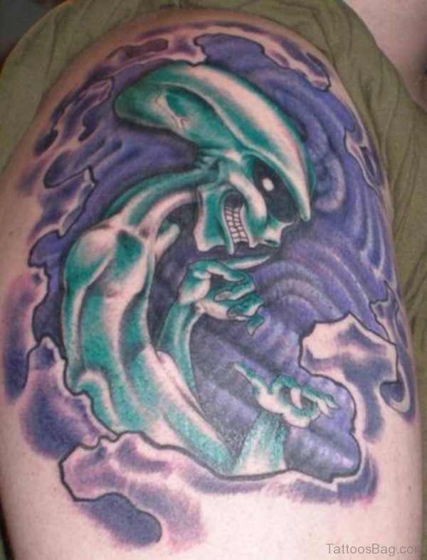 Blue Ink Alien Tattoo